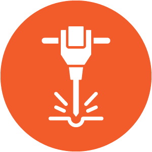 Icon of a white jackhammer in use, depicted on an orange circle background.