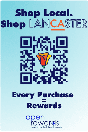 Poster promoting local shopping in Lancaster with a QR code and text: "Shop Local. Shop Lancaster. Every Purchase = Rewards." Features "open rewards" logo.