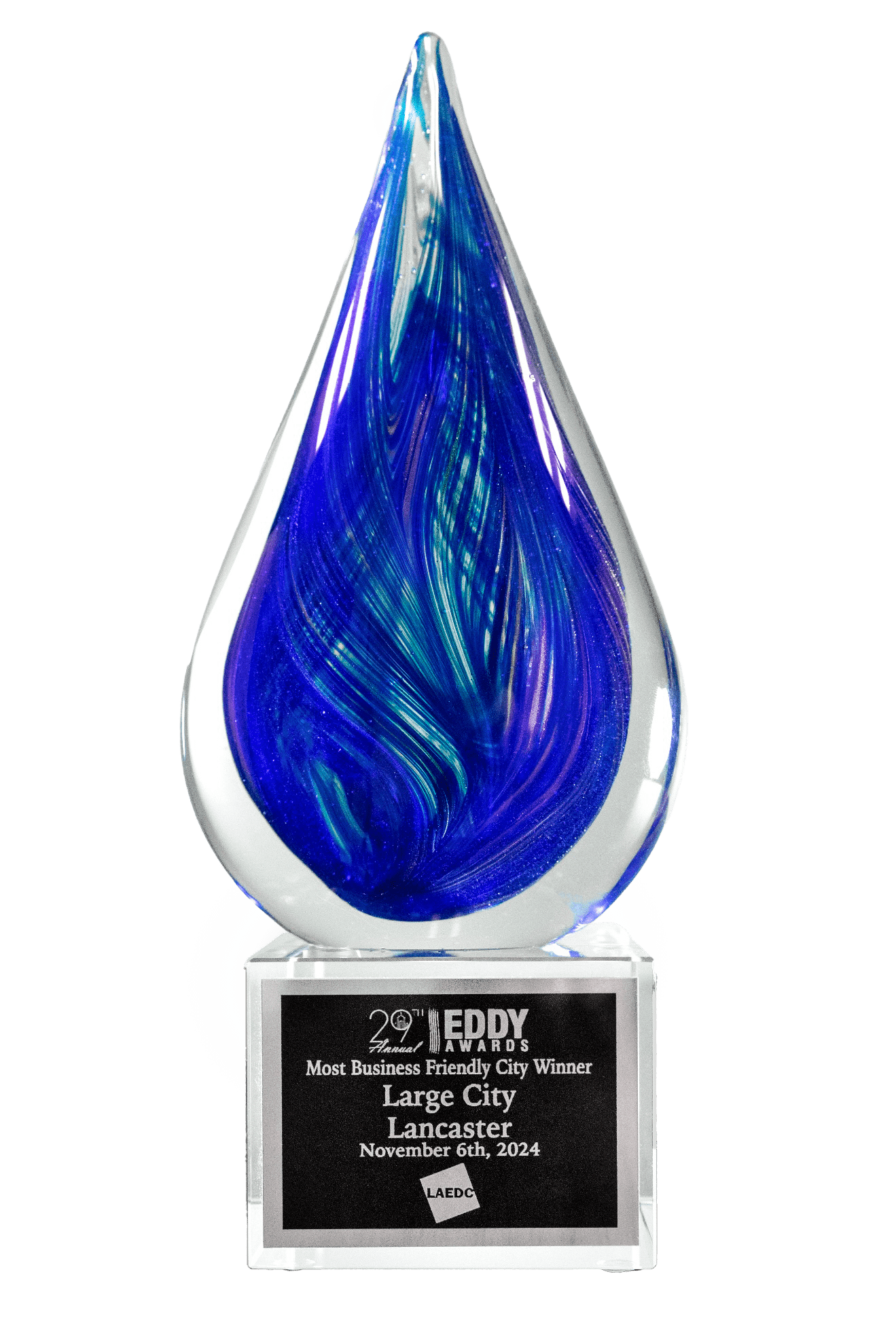 A blue glass award shaped like a drop, labeled "Most Business Friendly City Winner, Large City, Lancaster, November 6th, 2024.