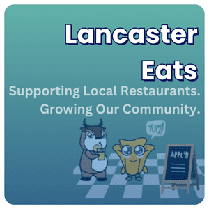 Lancaster Eats poster promoting local restaurants with cartoon animals and a chalkboard sign.